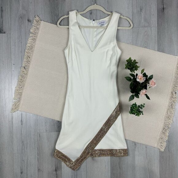 Bebe Asymmetrical Mini Dress Hem Off White Gold Trim Rhinestone Embellishment XS - Picture 1 of 10